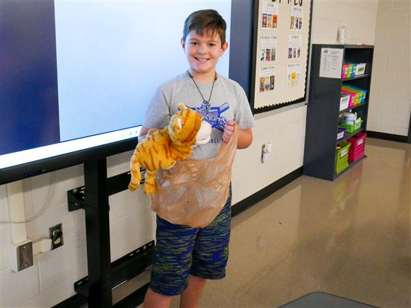 Fifth Graders putting on a Pun Fashion Show.